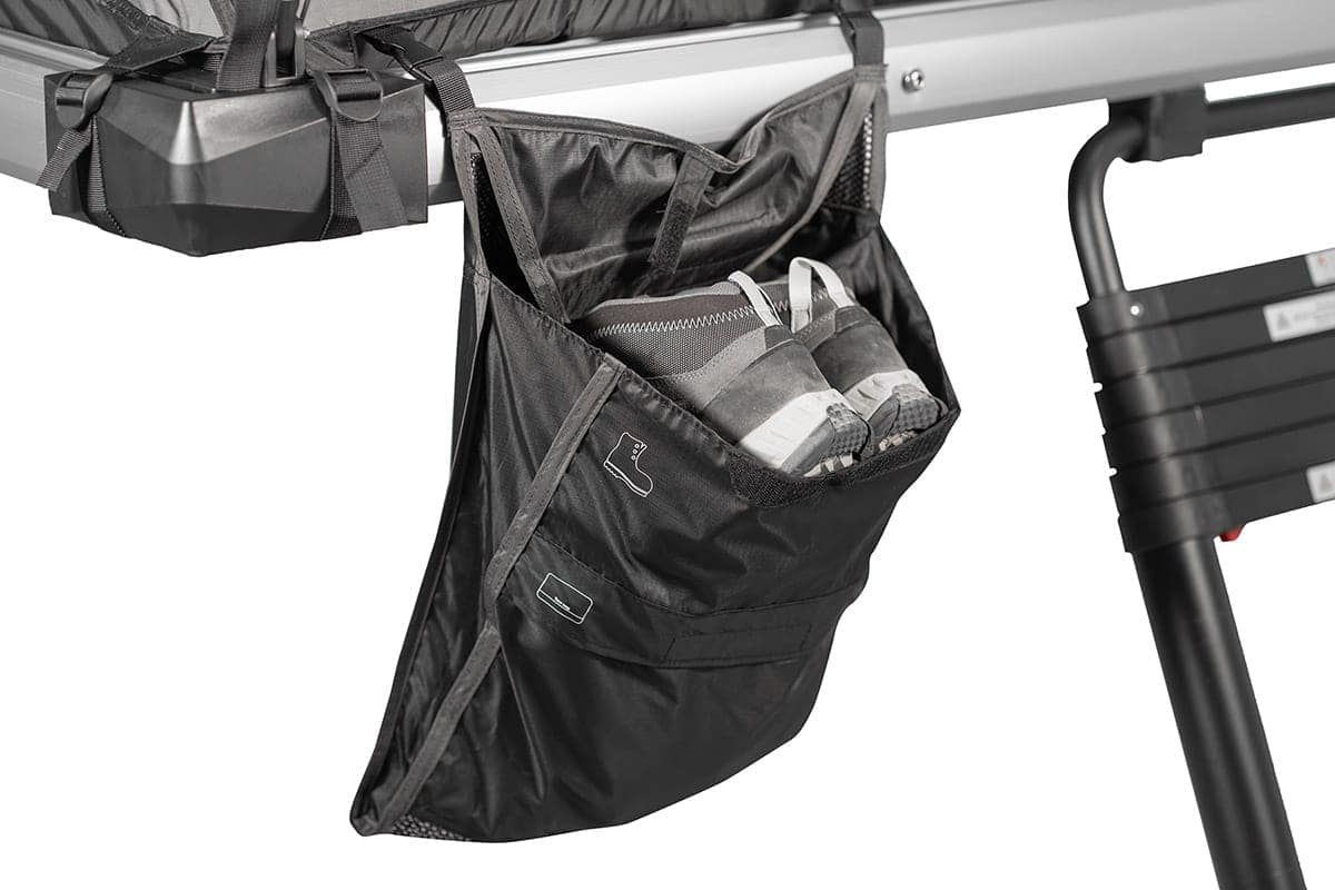 Sac de rangement suspendu sous la plateforme de la tente de toit